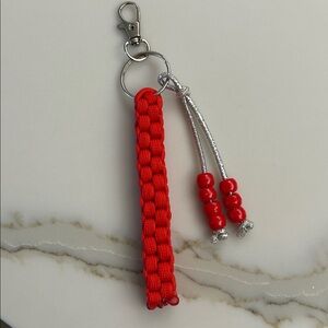 Red handmade paracord keychain/purse charm with silver hardware